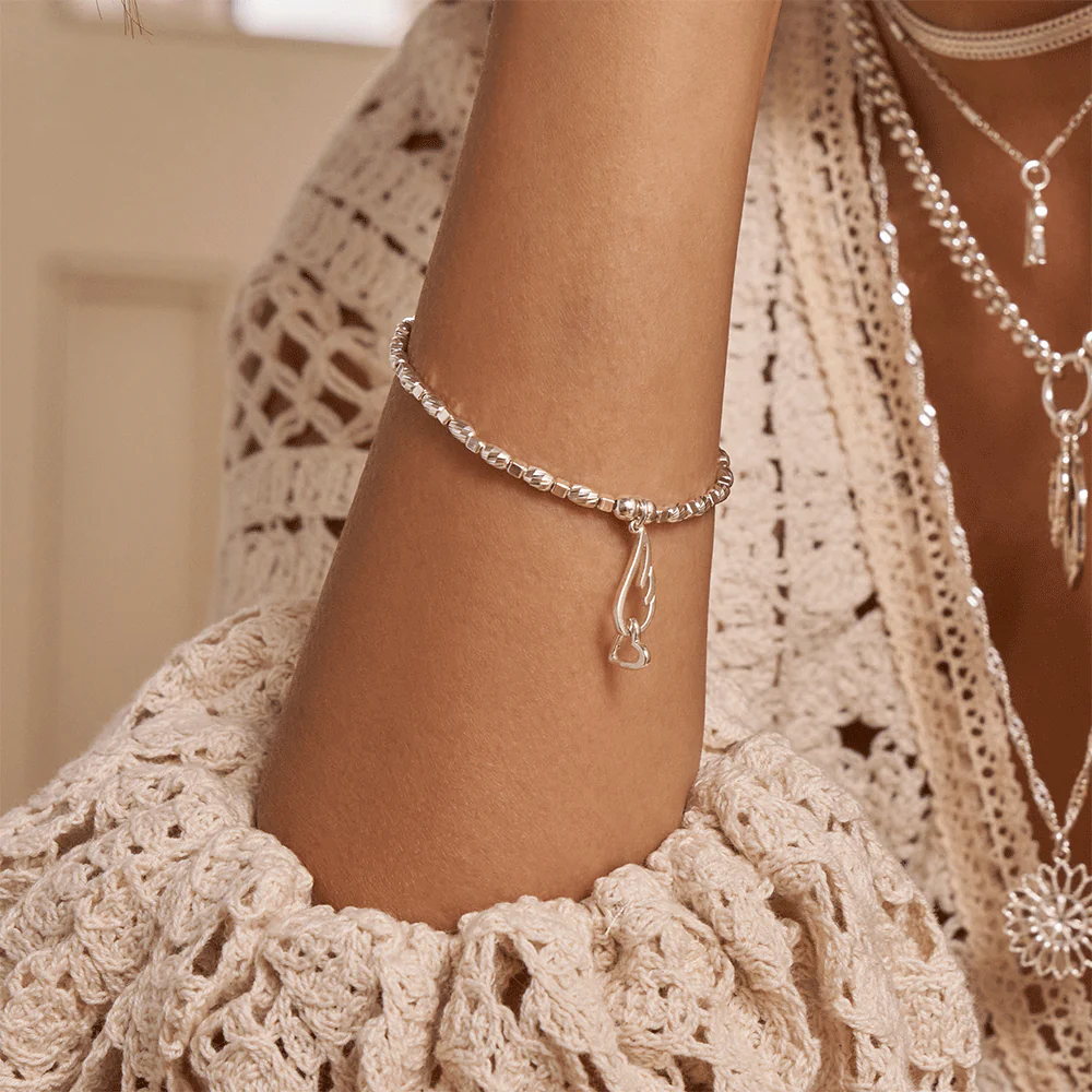 Soul Glow Interlocking Heart & Angel Wing Bracelet - Image 2